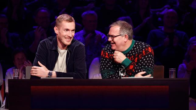 Rateteam-Kapitän Elton mit Basketballspieler Niels Giffey.